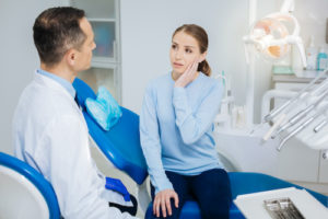 doctor walks patient through her root canal